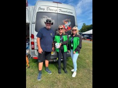 Barry accepting donation from Greenall Team
